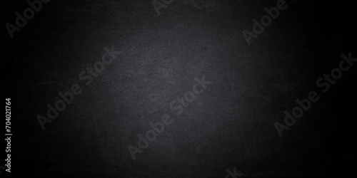 Horizontal textured black grunge background. Dark concrete stone wall background with copy-space