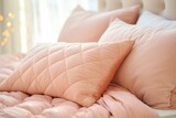  a close up of a bed with pink pillows and a white headboard with a string of lights on the side of the bed and a window in the background.