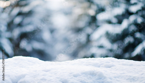 Winter wonderland: Snow-covered landscape with trees under bright sun