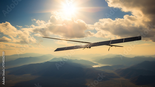 An experimental solar-powered aircraft flying high in the sky demonstrating sustainable aviation technology.