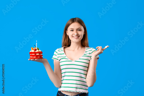 Pretty young woman with tas...