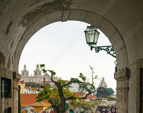 A glimpse through an archway in the old hilltop Alfama district of Lisbon