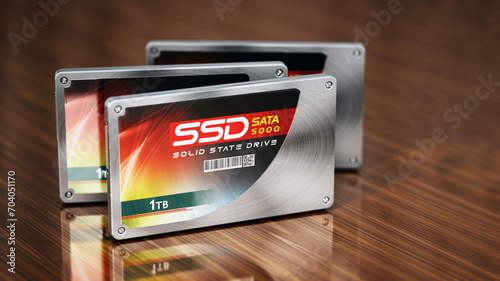 Generic SSDs standing on wooden table. 3D illustration
