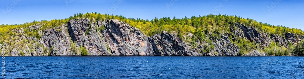 Panorama of Bon Echo Provincial Park landscape image with Mazinaw rock view in Ontario, Canada.