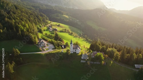 Aerial view of the beautiful Slovenian Alpine landscape with St Spirit church photo