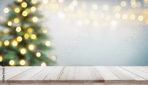 abstract living room decor with christmas tree and string lights on white wood table top for holiday banner or product advertisement display with snowy background