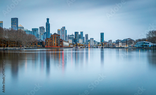 Photography View of skyscrapers in London city as seen from Surrey docks, England