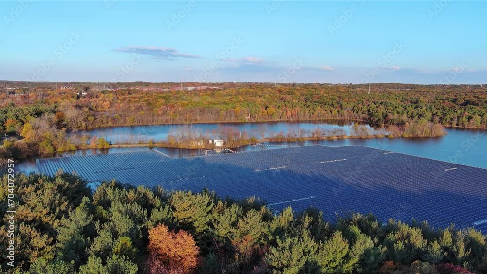 Solar panels float on lake water during an environmentally friendly electricity generation process