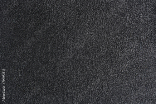 Macro background made of black leather texture. © freeman83