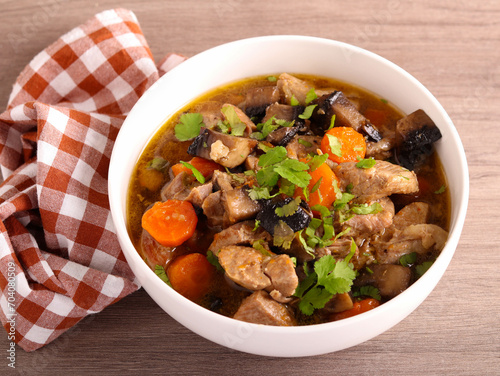 Meat and mushroom stew with carrot