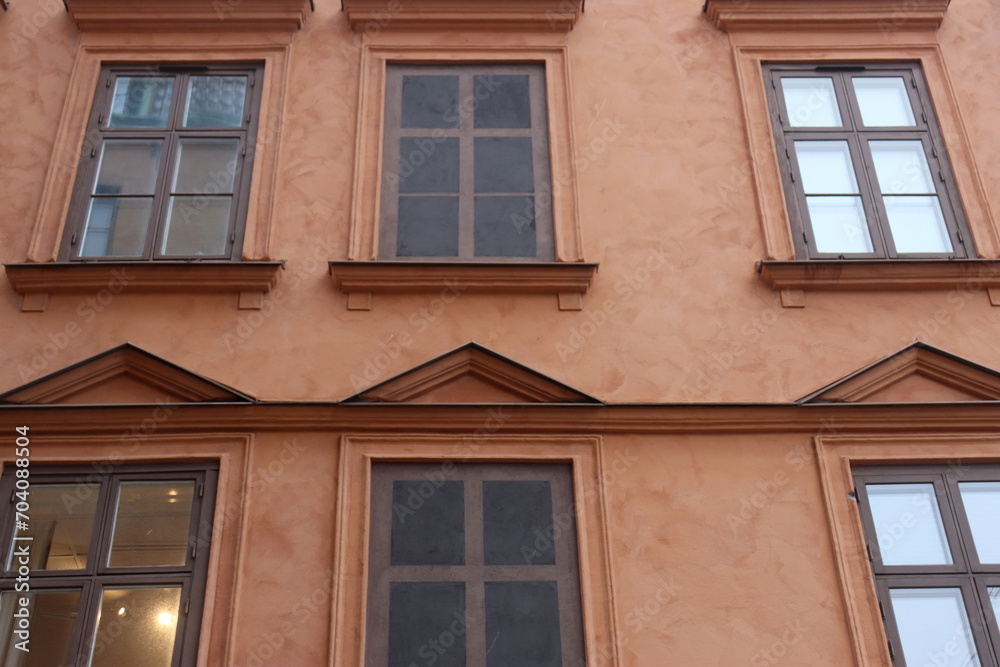 Painted windows on the facade of a building in Stockholm