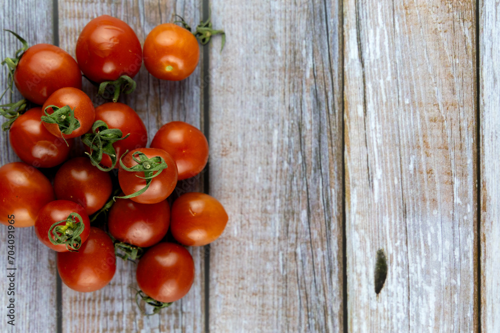 tomatoes on wooden background tomatoes on wooden background
