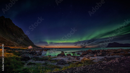 Aurora Borealis on sky in Lofoten Islands