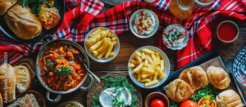 Wallpaper Mural Brazilian June festival cuisine on red plaid fabric. Festa junina. Torontodigital.ca