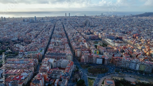 Aerial around downtown Barcelona on a sunny day in early spring