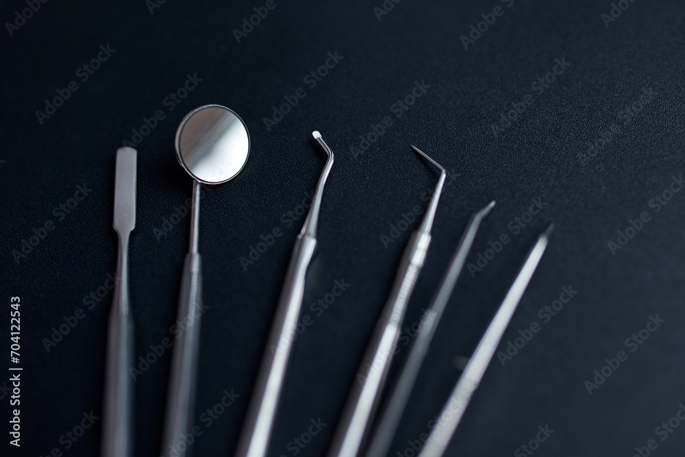Dental tools on black background
