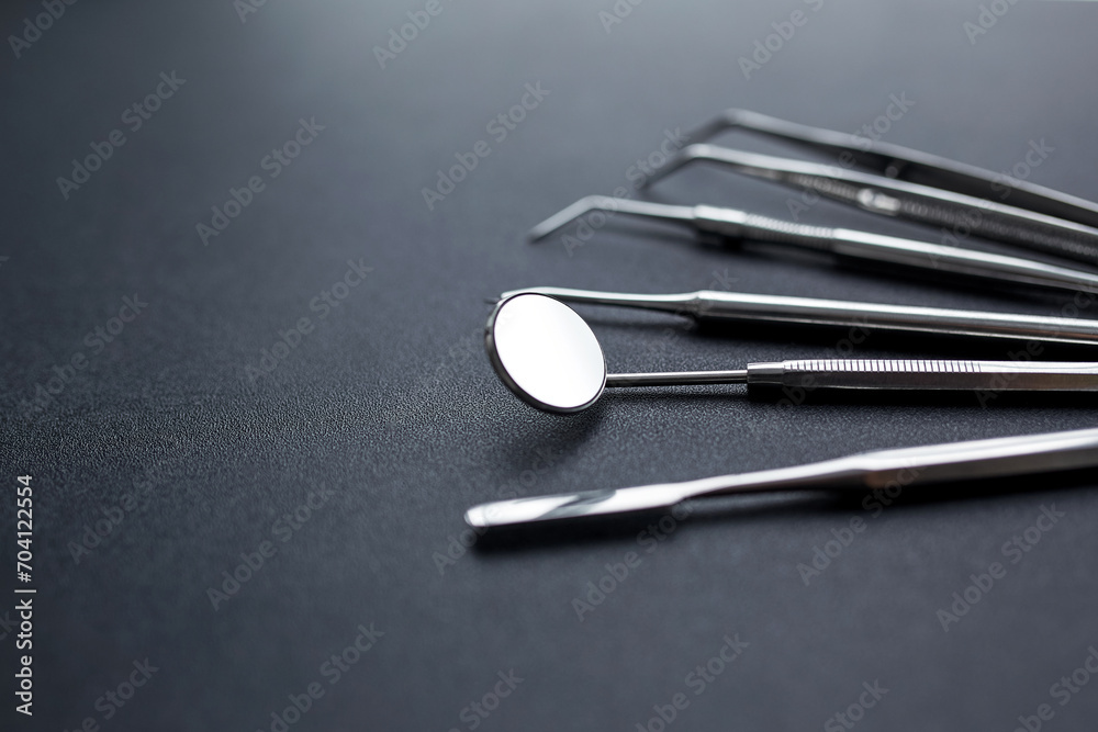 Dental tools on black background Dental tools on black background
