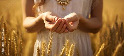 a woman in wheat field folding her hands together close-up, Generative AI