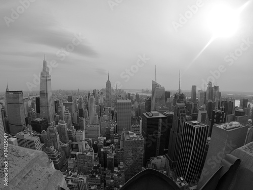 Black and withe photo of New York City from the sky with its iconic buildings