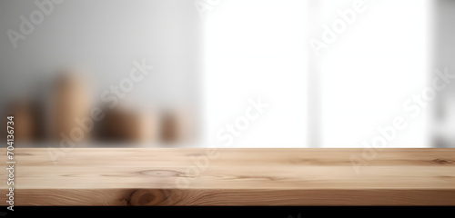 Light wood table top on blur white gray abstract background - can be used for display or montage your products