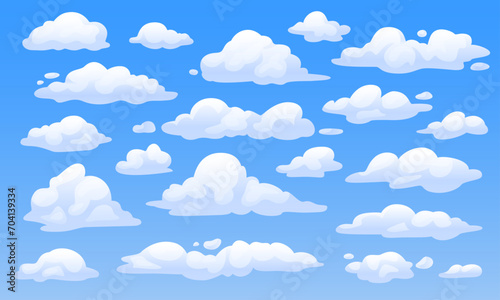 Set of white clouds in cartoon style on a blue background. Vector fluffy clouds for sky landscape. Weather elements