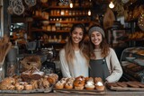 Two women share a moment of joy as they stand side by side in a cozy bakery, their faces lit up with smiles as they admire the tempting array of baked goods and pastries on display