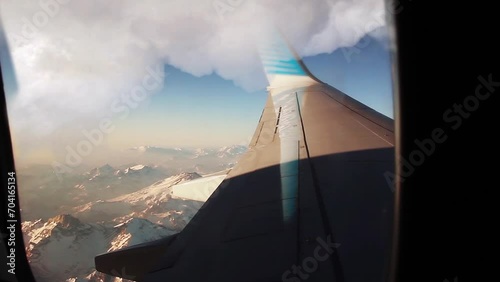 Flying Over the Andes Mountains, Andes Mountain Range Seen from the Window of a Commercial Plane.  photo