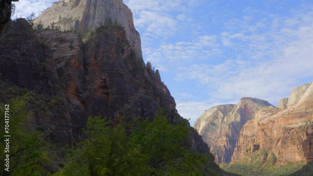 Establishing shot of mountains with red rocks in Weeping Rock, Zion National Park, Utah, North America. Day time. ProRes 422 HQ. Establishing shot of mountains with red rocks in Weeping Rock, Zion National Park, Utah, North America. Day time. ProRes 422 HQ.