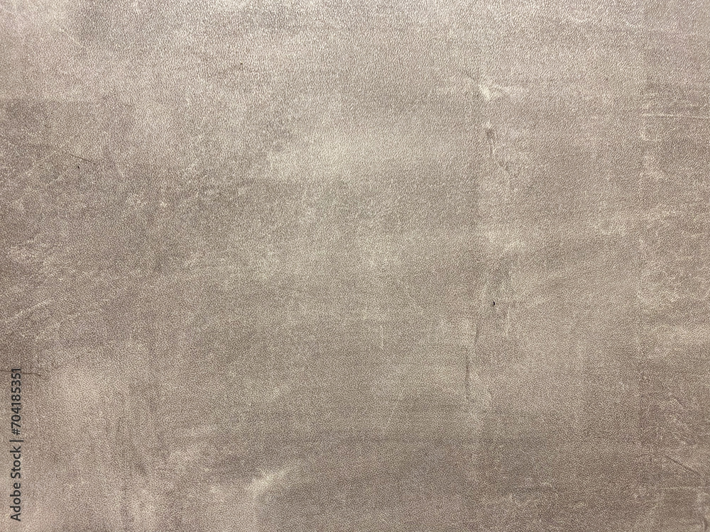 Naklejka premium A beautiful stone wall with a scratched and messy effect.