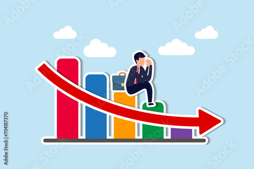 Economic recession, financial crisis or stock market crash due to COVID-19 Coronavirus pandemic concept, unemployed businessman investor or business owner sitting on falling down bar graph, red arrow.