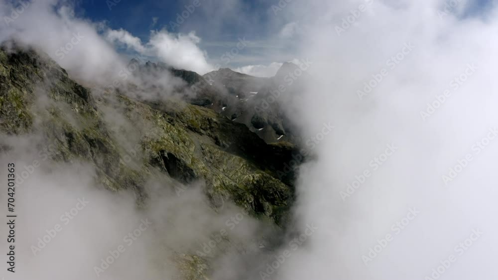Aerial Forward Idyllic Shot Of Natural Rock Formations, Drone Flying Forward In Clouds On Sunny Day - French Alps, France Aerial Forward Idyllic Shot Of Natural Rock Formations, Drone Flying Forward In Clouds On Sunny Day - French Alps, France