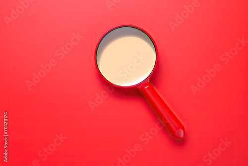 Magnifier magnifying exclamation mark on red background. Alert and precaution concept. Caution and risk management security signal announcement hazard