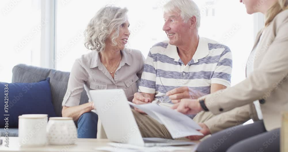 Financial advisor, senior couple and home meeting, documents and laptop for asset management, loan or investment. Business agent consulting with elderly clients for insurance benefits, advice or help Financial advisor, senior couple and home meeting, documents and laptop for asset management, loan or investment. Business agent consulting with elderly clients for insurance benefits, advice or help