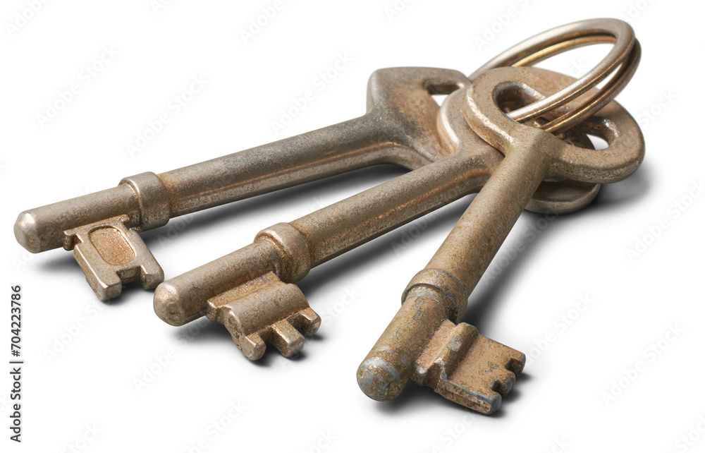 bunch of old door keys, three used metallic silver house keys isolated on white background, selective focus with copy space bunch of old door keys, three used metallic silver house keys isolated on white background, selective focus with copy space