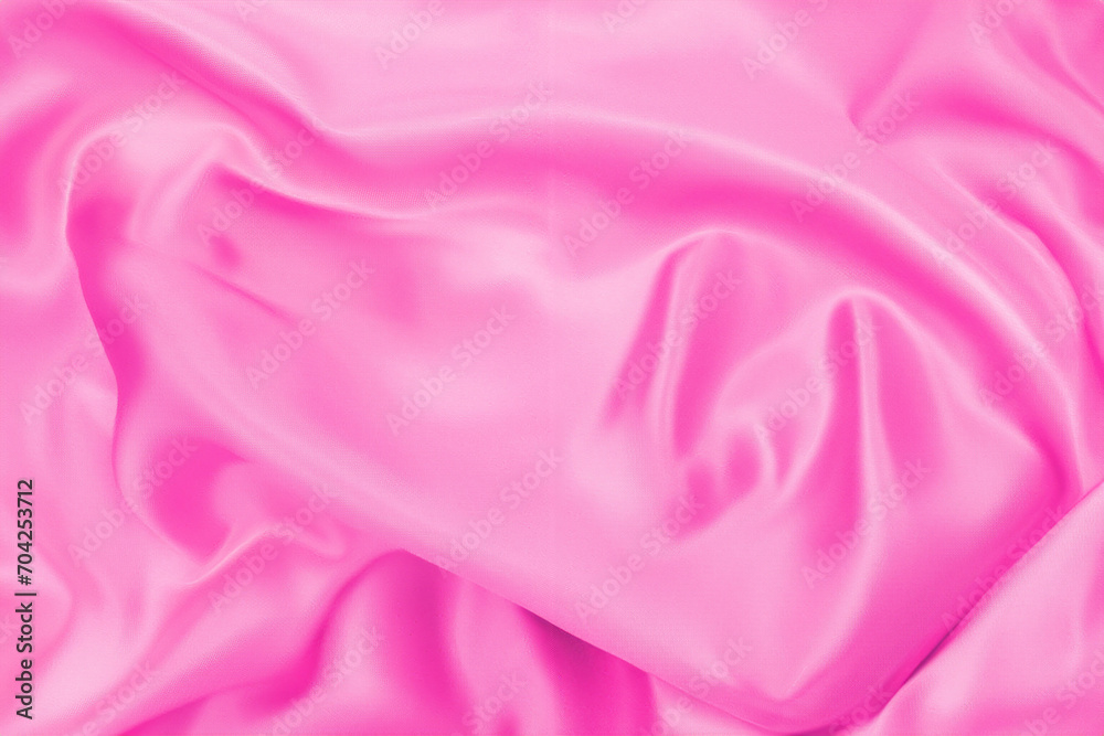 Fototapeta premium Plastic pink satin fabric texture soft blur background