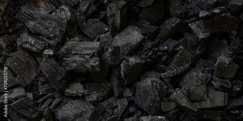 black coal background. charcoal woody black.  lot of wood photo