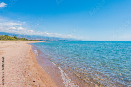 Mountain lake, clean transparent water. Coastline. Kyrgyzstan, Lake Issyk-Kul. natural background. Landscape