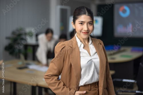 Portrait of financial advisor in modern office. Working with commitment and confidence.