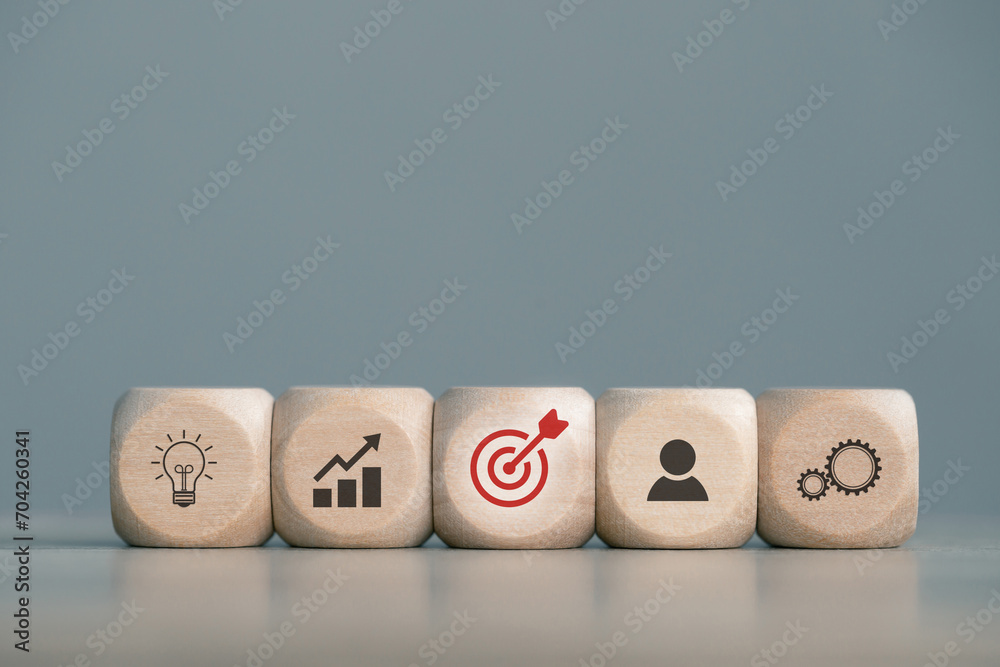 wood cube block with organizational growth and sales according to business goals
