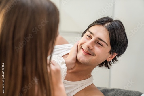 Beautiful young people having fun outdoors. Valentine's Day concept. Lovers at home celebrating Valentine's Day.