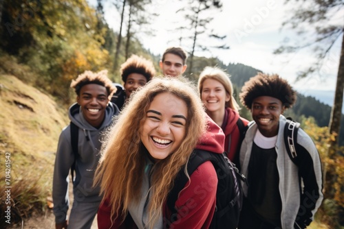 Group of diverse friends hiking in the mountains