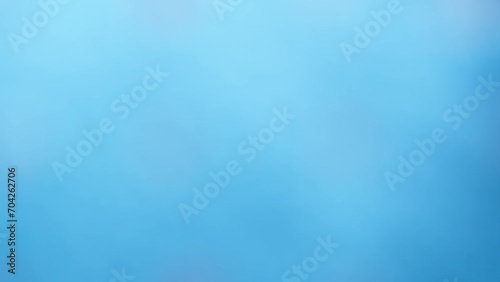 Abstract animated blue background with slight shimmer and gradient.