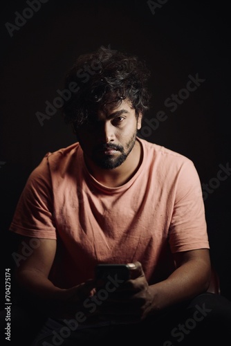 dark portrait of a indian man, low light indian man face images, Young Indian Man In dark Face Portrait Angry Serious © om