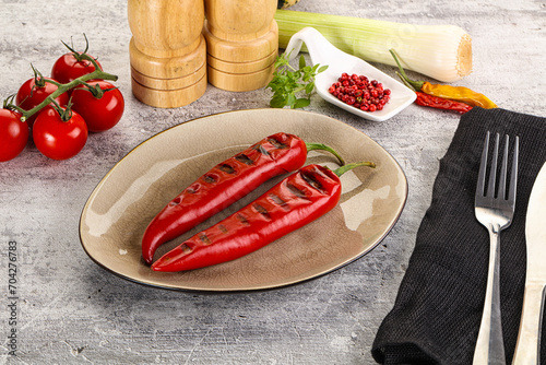 Grilled red spicy pepper snack photo