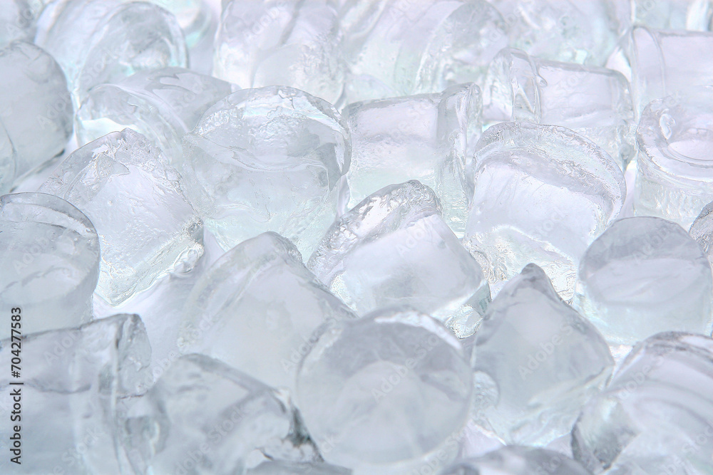 The ice cubes are scattered in a chaotic order. Background