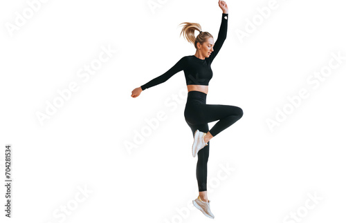 Fototapeta Naklejka Na Ścianę i Meble -  Pretty caucasian young woman in sportswear and towel wrapped around neck talks by phone against transparent background looks at camera smiles. Active people, workout. Women at sport club.