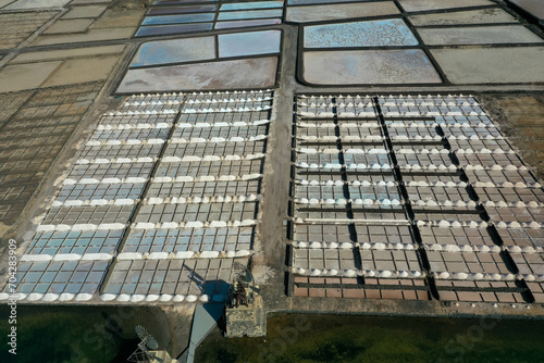 On the south coast of Lanzarote, near the fishing village of El Golfo, is the salt mining plant Salinas del Janubio, which is separated from the open sea by a headland. Aerial view. Canary Islands photo