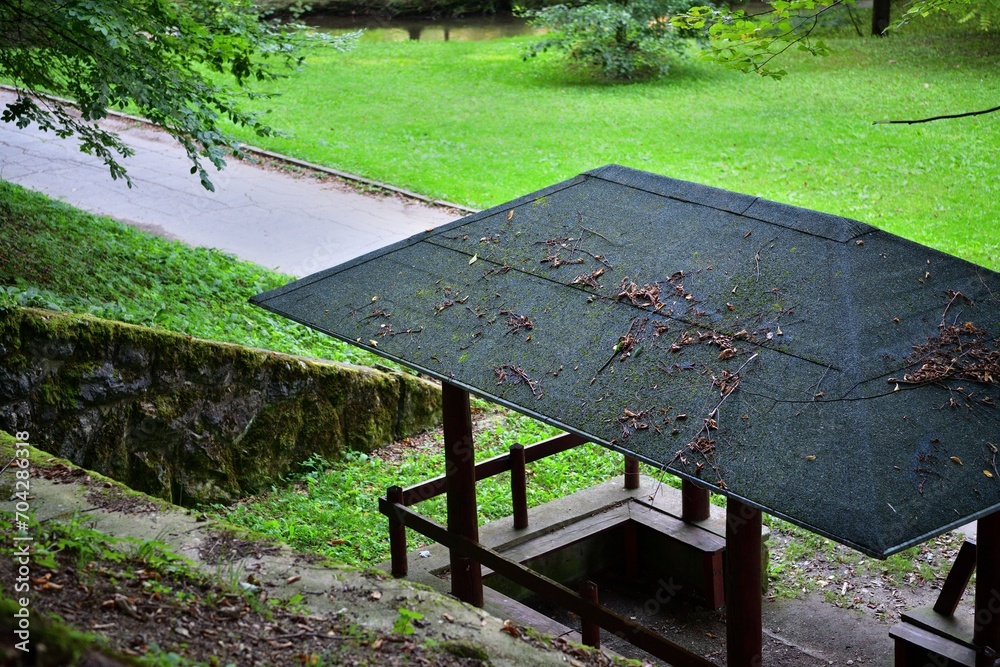 Relaxing tourist wooden shelter in the forest