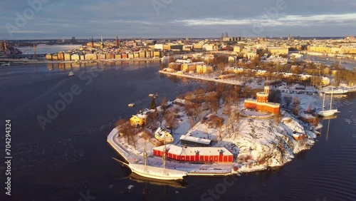 Panoramic view of Stockholm, Sweden in winter, with snow. Kastell fort, kastellholmen, skeppsholmen and the old town. Morning sunlight photo