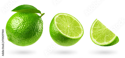 Lime isolated set. Collection of ripe lime, half and piece of lime on a transparent background. Fruit levitation. photo